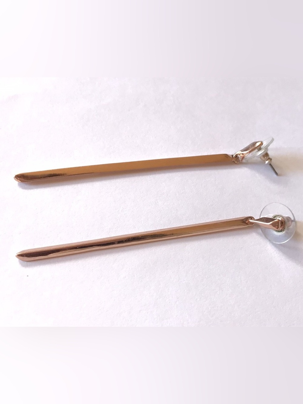 BCBGeneration rose gold tone vertical bar dangle earrings